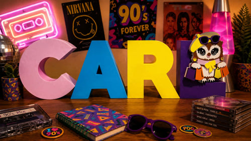 A styled tabletop scene with large pastel letters spelling your name, surrounded by retro decor including neon cassette and lava lamp signs, 90s posters, sunglasses, a notebook, CDs, and a small owl character on a purple block.